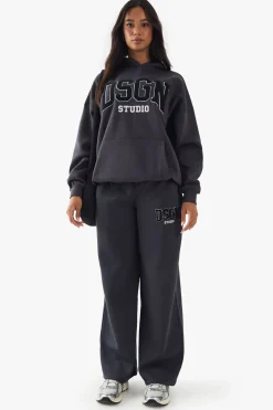 Jogging DSGN Studio en Tissu Éponge avec Appliqué Coupe Droite