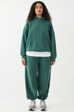 Jogging DSGN Studio Sport Training Club Coupe Oversize avec Chevilles Resserrées