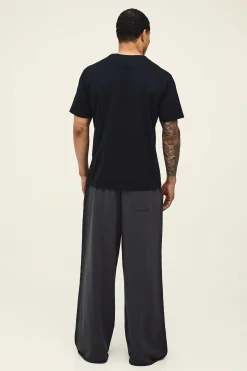 boohooMAN Jogging À Jambes Extra Larges En Molleton Bouclé Avec Broderie Script "MAN" Et Ourlet Brut<Homme Jogging|Tout Afficher