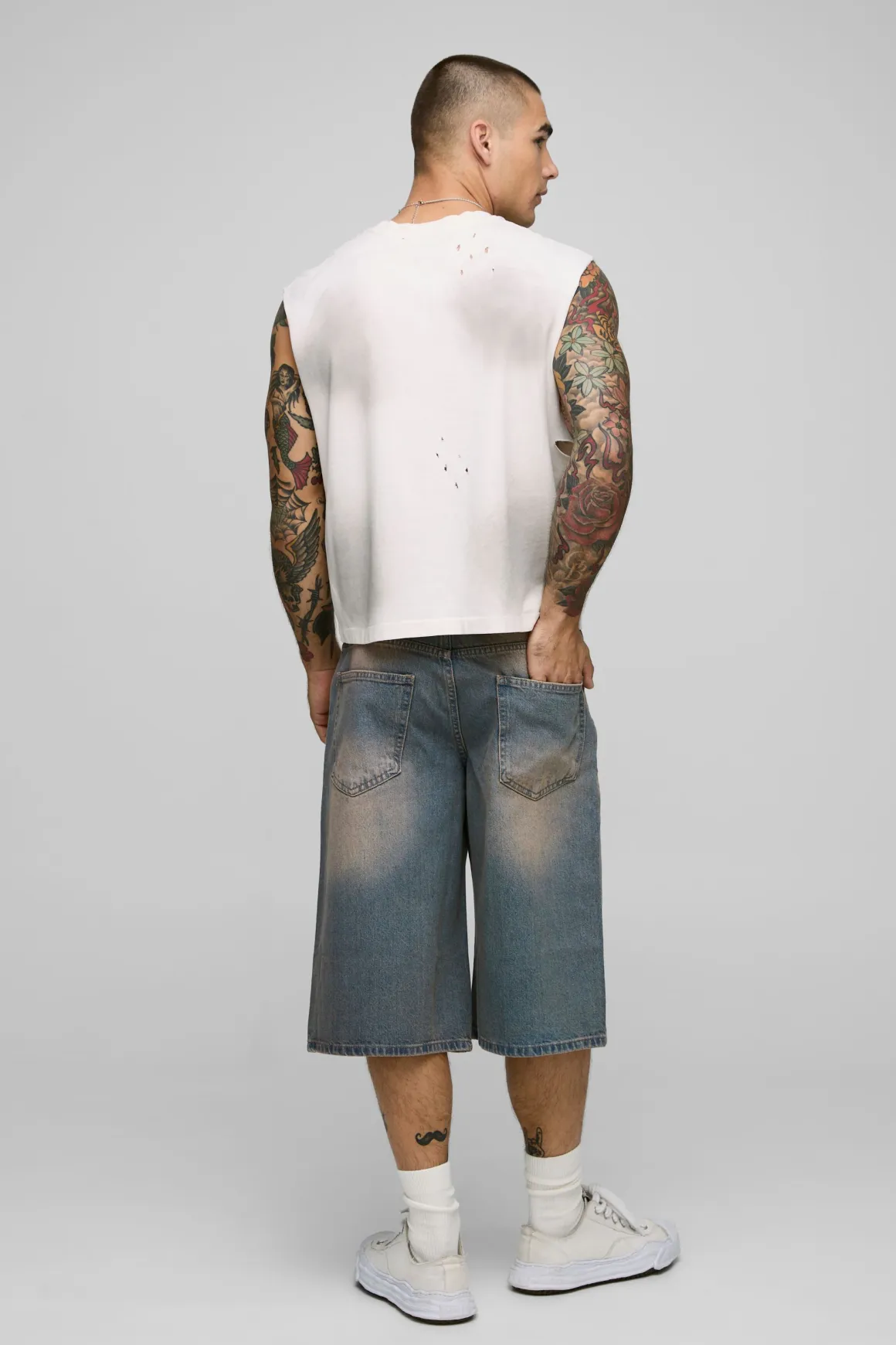 Jorts en denim délavé à coupe longue