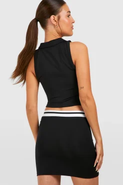 Jupe en tissu technique avec ceinture contrastée et passepoil
