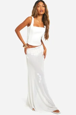 Jupe maxi en maille brodée de fleurs