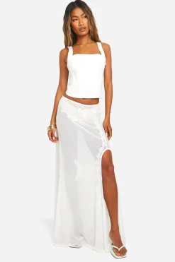 Jupe maxi en maille brodée de fleurs