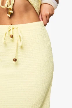 Jupe maxi texturée à cordon avec perles