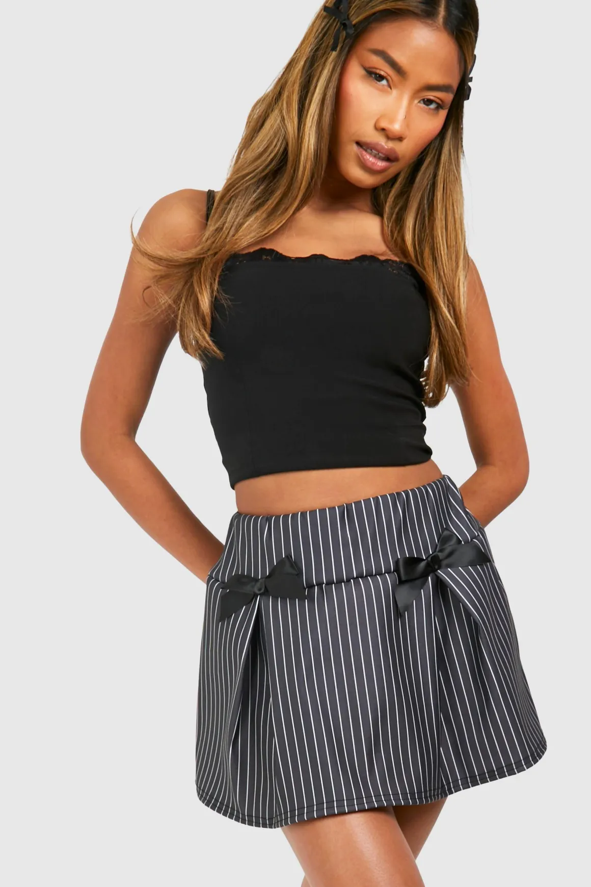 Jupe micro mini rayée à nœud ruban