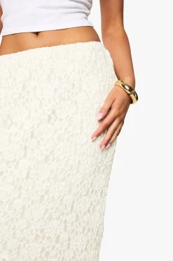 Jupe midi en dentelle à volants et ourlet asymétrique