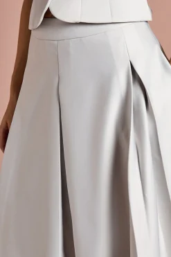 Jupe Midi Évasée en Satin à Plis Devant