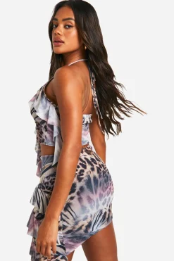 Jupe mini asymétrique en mesh léopard à volants