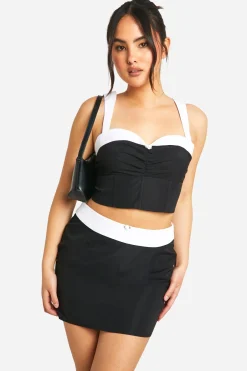 Jupe Mini à Ceinture Contrastante et Détail Floral