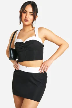 Jupe Mini à Ceinture Contrastante et Détail Floral