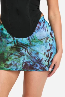 Jupe mini en mesh texturé imprimé