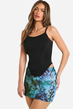 Jupe mini en mesh texturé imprimé