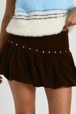 Jupe mini en velours clouté style puffball