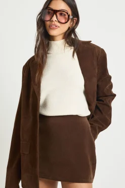 Jupe mini look synthétique-suédé