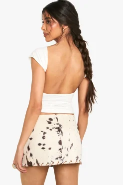Jupe mini à motif vache en faux suède