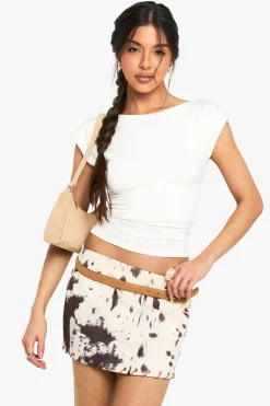 Jupe mini à motif vache en faux suède