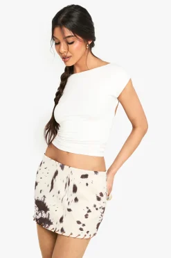 Jupe mini à motif vache en faux suède