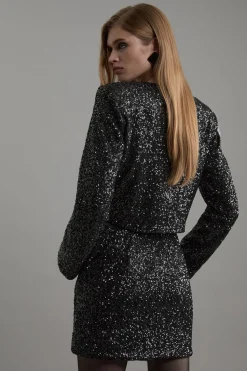 Jupe mini portefeuille sur-mesure en sequins