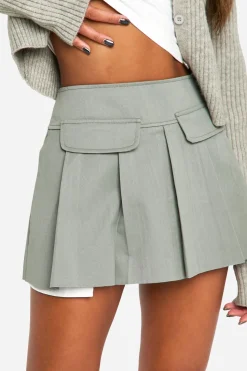 Jupe mini tissée plissée avec détails de poche