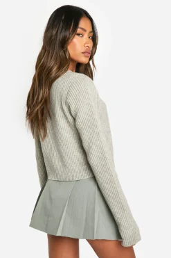Jupe mini tissée plissée avec détails de poche