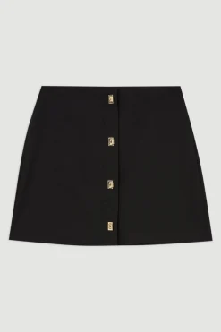 Jupe tissée en coton techno avec fermoir doré