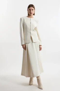 Jupe évasée de soirée en tissu stretch compact à détails de couture ajustée