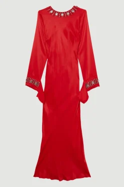 La robe maxi portefeuille en satin à bord brut ornée de cristaux The Founder
