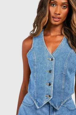 Longline Denim Waistcoat se traduit par Gilet en denim long