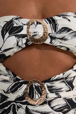 Maillot de bain grande taille échancré en tissu fluide à imprimé palmier