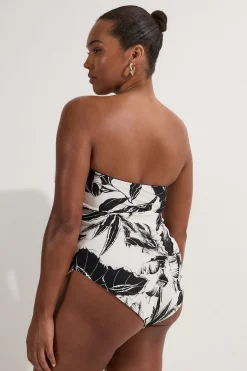 Maillot de bain grande taille échancré en tissu fluide à imprimé palmier