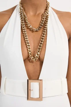 Maillot de bain plongeant à ceinture avec détails métalliques