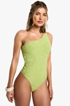 Maillot de bain à une épaule orné d'une fleur d'hibiscus embossée