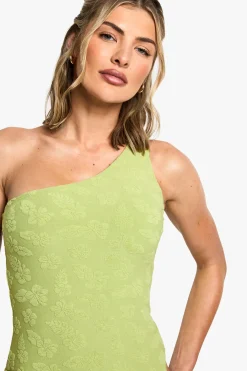Maillot de bain à une épaule orné d'une fleur d'hibiscus embossée
