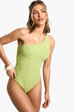 Maillot de bain à une épaule orné d'une fleur d'hibiscus embossée