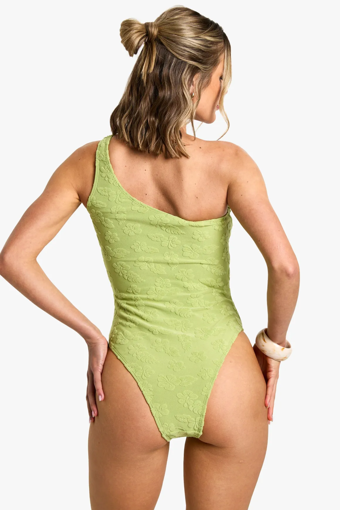 Maillot de bain à une épaule orné d'une fleur d'hibiscus embossée