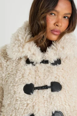 boohoo Manteau à bouton-pression en fourrure shaggy<Femme Vestes & Manteaux