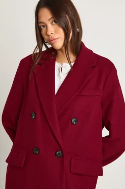 Manteau à l'aspect laine avec détail de manchette surdimensionnée