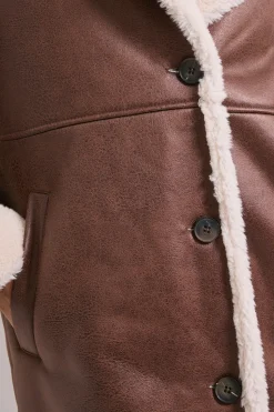 Manteau Mi-long en Peau Lainée