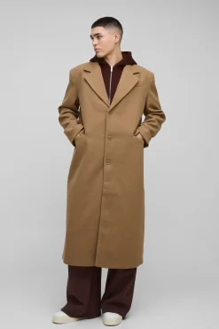 Manteau surdimensionné avec couche en jersey à capuche factice en beige