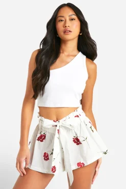 Mini jupe en coton fleuri à ceinture