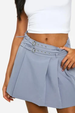 Mini-jupe longue plissée avec ceinture à boucle
