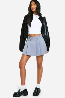 Mini-jupe longue plissée avec ceinture à boucle