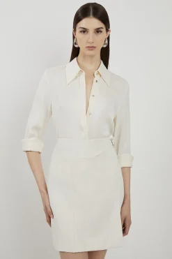 Mini-jupe Plissée Ajustée avec Détail Boucle