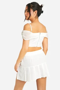 boohoo Mini-jupe plissée à détail noué<Femme Jupes|Jupes
