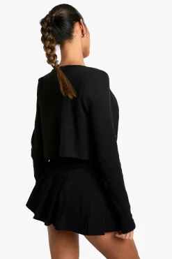 Mini-jupe plissée à détails de boucle