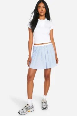 Mini-jupe plissée à taille contrastée en tissu froissé
