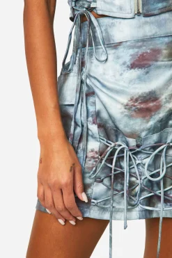Mini-jupe tie-dye à lacets tonale