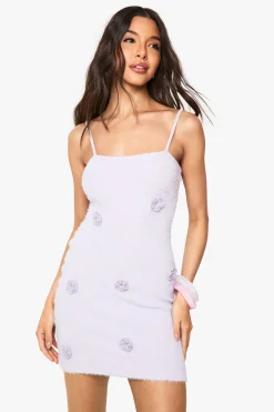 Mini robe au crochet avec détails fleuris tricotés