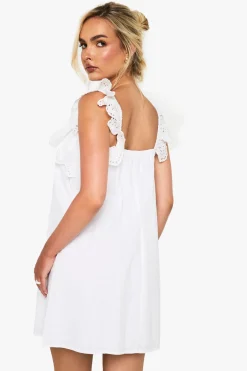 Mini robe chemisier en crochet de coton à volants