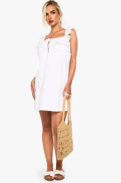 Mini robe chemisier en crochet de coton à volants